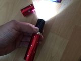 TMN Paralyzér s LED baterkou v tvare rúžu červený